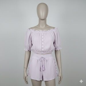 Lilac Ruffled Top and Shorts Set Size Small Pit to Pit 18”. Waist 11” to 14”.